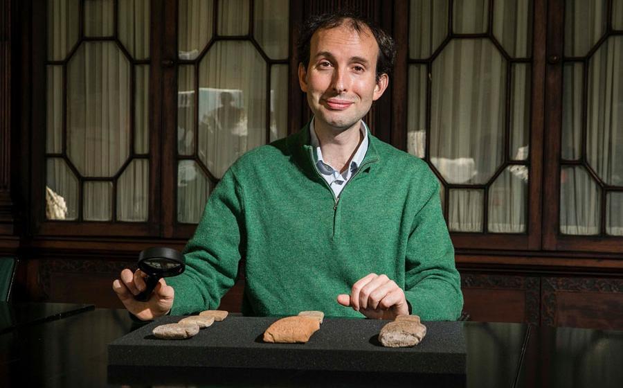 Dr. Martin Worthington, who was hired to attain authenticity in Marvel’s Eternals, in the Library of Trinity College Dublin pictured with a collection of cuneiform tablets written in ancient Babylonian language. Source: Trinity College Dublin