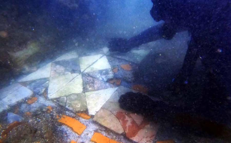 Underwater archaeologist exploring the ancient remains of Baiae. Source: Naumacos / Campi Flegrei Archaeological Park