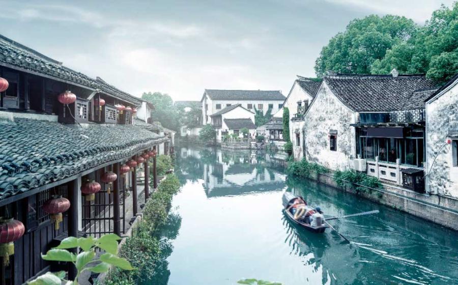 The waterway wonders of China’s Grand Canal are both picturesque and ancient in some sections but also super modern and unattractive in others. This part of the canal is in the ancient, preserved section of Shaoxing, Zhejiang, China. Source: gui yong nian / Adobe Stock