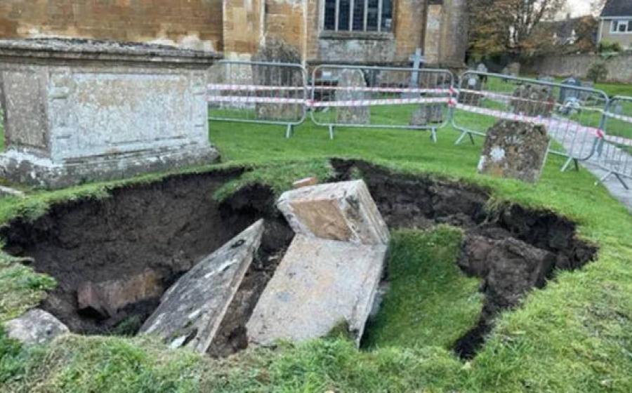 The collapsed tomb in the graveyard of All Saints Chuech, Martock, Somerset.