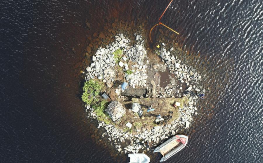 Aerial view of the Loch Bhorgastail crannog on the Isle of Lewis, Scotland