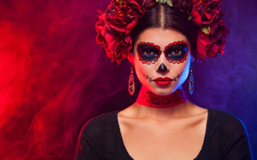 Lady dressed up as La Catrina for Dia de los Muertos.