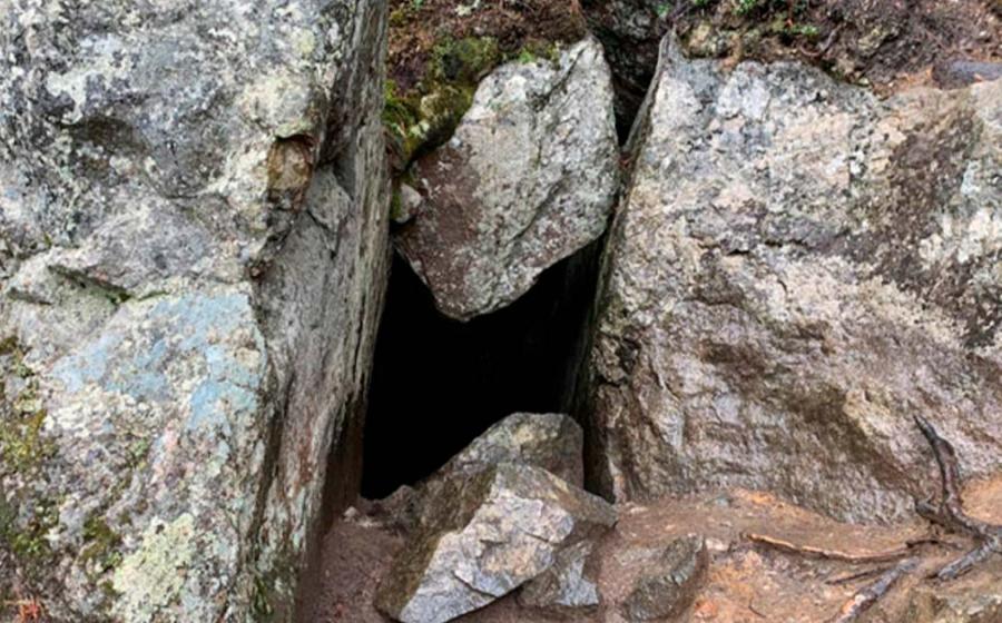 Nestled within Koli National Park, the Pirunkirkko cave, known as the Devil's Church in English, has become renowned for its purported connection to the spirit realm. Source: University of Eastern Finland