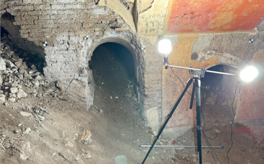 Arched doorways and colorful frescoes inside the Domus Liceo Cavour beneath the school gym