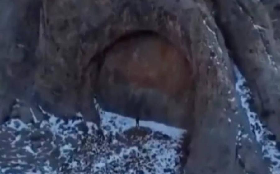 Drone footage showing the massive stone doorway formation in Kazakhstan's Dzungarian Alatau mountains