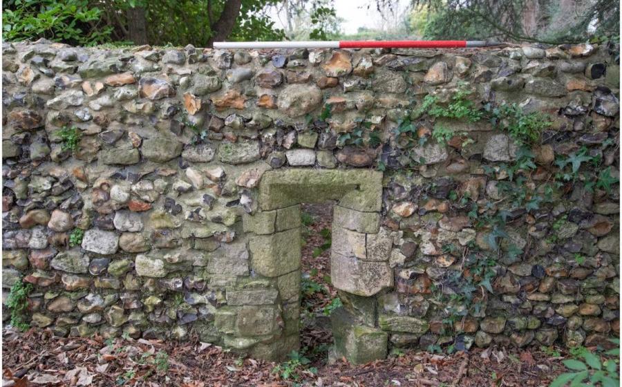 The garden ruin of Bosham Manor House, featuring a lancet window on the northern half of the west wall. Archaeologists have discovered evidence of the once home to Harold Godwinson, the last Anglo-Saxon king.