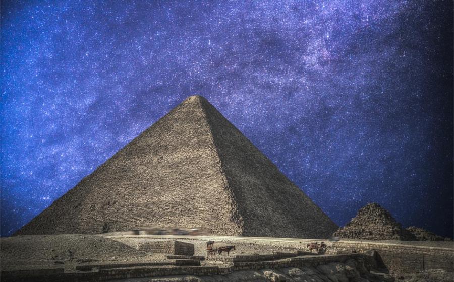 Egypt’s Pyramids of Giza, in the night sky. 	Source: 	Aliaksei / Adobe stock