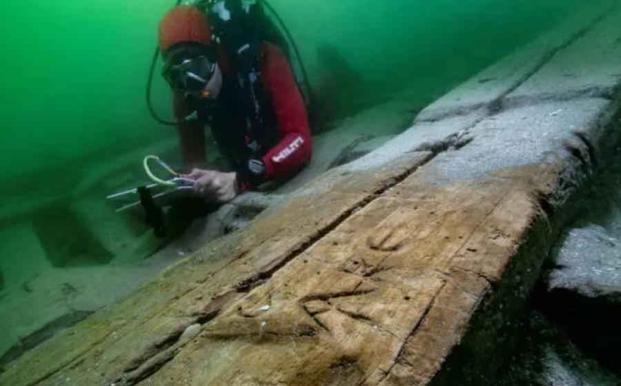 The boat’s well-preserved timbers  including grafitti.