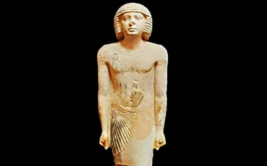 Unique limestone family statue from Gisr el-Mudir, Saqqara, showing nobleman with wife and daughter in mixed artistic styles from the Fifth Dynasty period