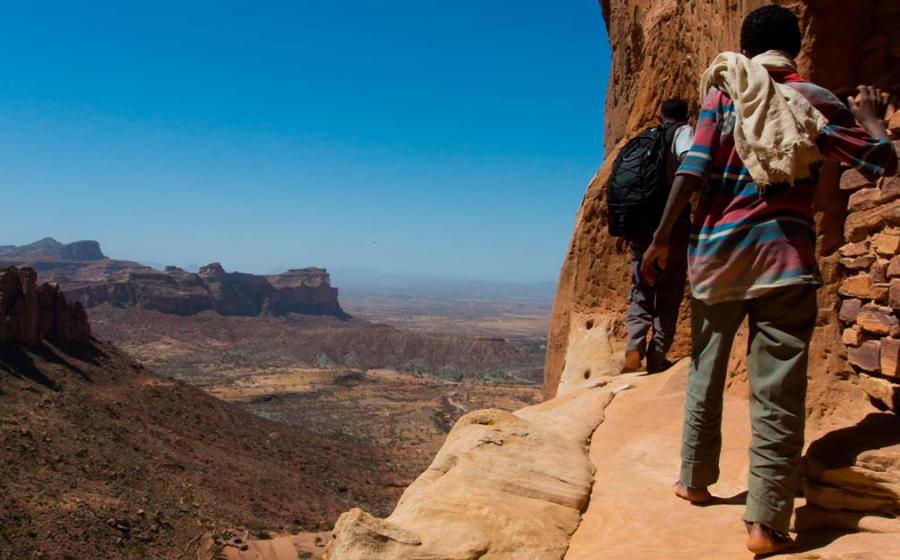 Towards the rock-hewn church of Abuna Yemata Guh in Tigray Ethiopia. Source: Reto Ammann / Adobe Stock.