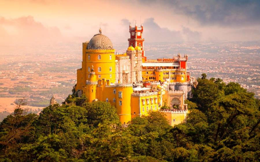 Pena Palace at sunset, Sintra, Portugal. Source: onnybas / Adobe Stock