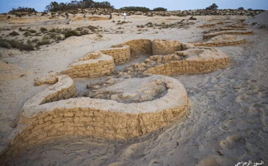 Excavated defensive walls and towers of the New Kingdom fortress at Tel Kharruba.