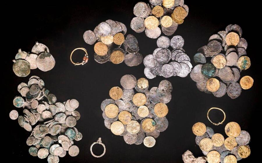 Archaeologists unearthed a cache of medieval coins at the Huqoq synagogue in northern Israel.