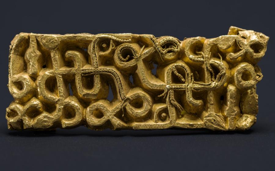 The richly decorated 1,500-year-old gold sword scabbard fitting.