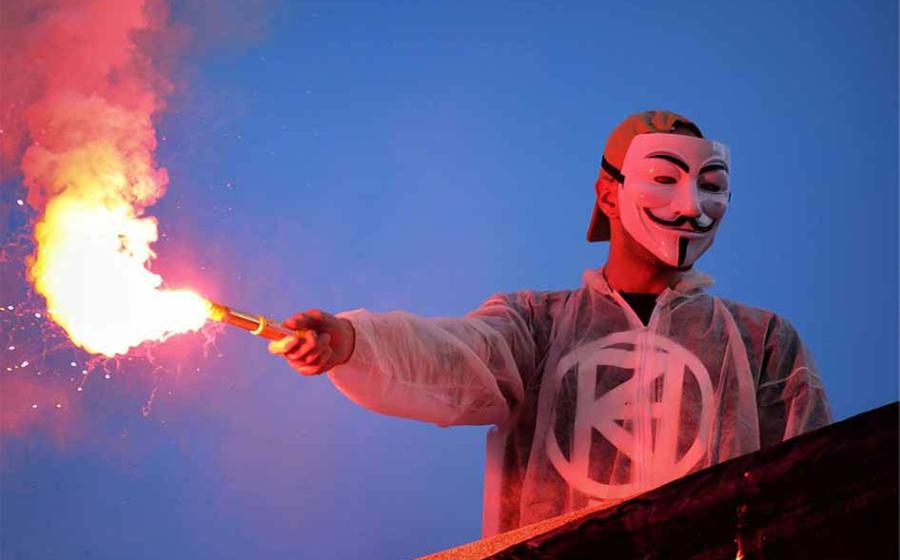 Guy Fawkes masks have become a symbol of anarchy and protest against tyranny, seen here during a protest in Madrid. Source: Daniel López García / CC BY 2.0