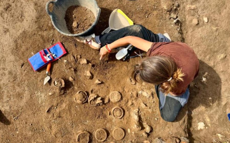 Archaeologist excavating ceramic pots at Hadrian's Villa.
