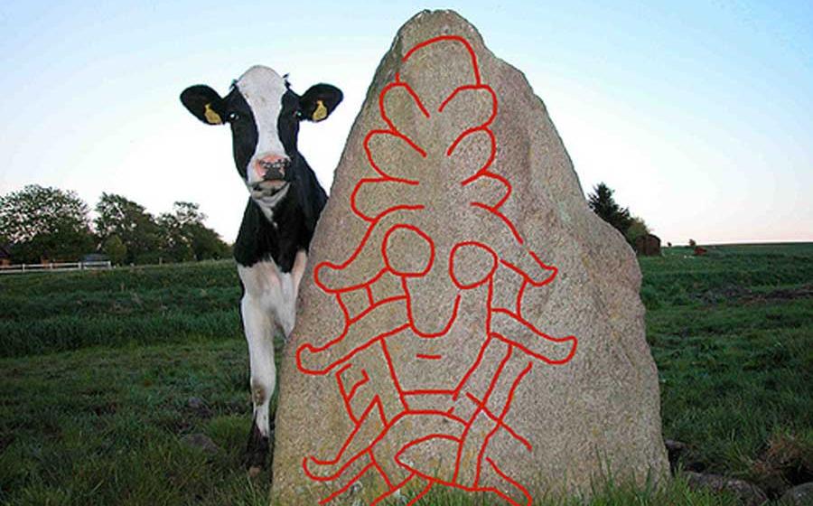 The Sjellebro Mask Stone with lines drawn in red chalk.