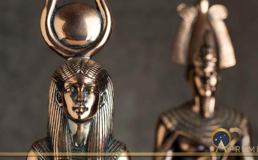 Isis with Osiris in the background ( OLGA RA/ Adobe Stock)