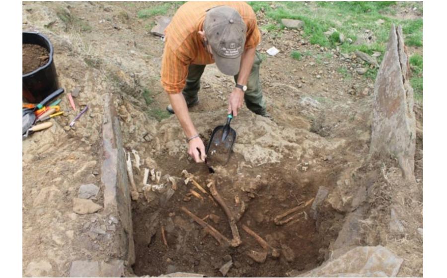Iron Age grave containing father and son weavers. 