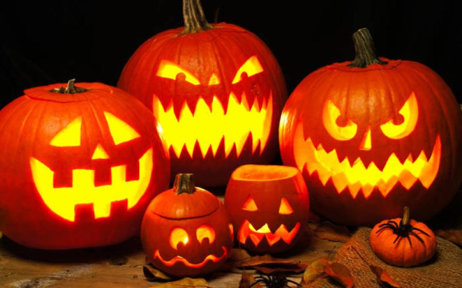 Spooky illuminated pumpkin Jack o Lanterns.  