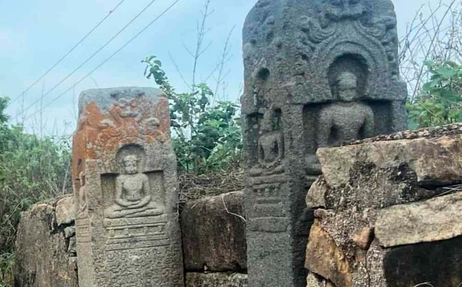 The Jain sculptures found at Moinabad, Hyderabad, India. Figures show a spiritual teacher of the dharma, seated in meditation and the top part adorned with Keerthimukhas. Source: E. Sivanagireddy/ The Hindu