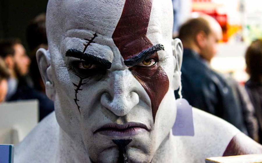 A closeup of Kratos the Greek god of strength, might and power as depicted in the popular video-game series God of War. Source: Matteo Pedrini / CC BY-SA 2.0