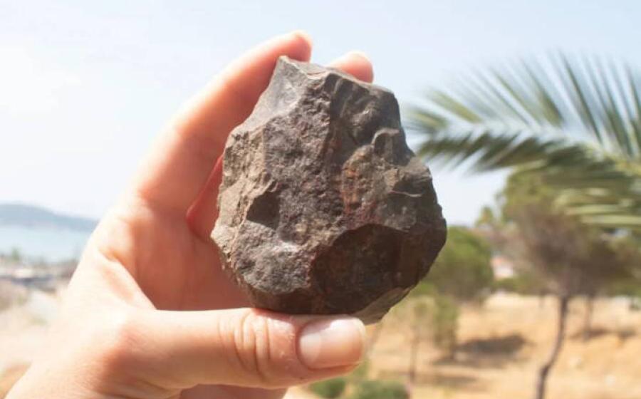 Paleolithic handaxe with broken distal end discovered during the Ayvalık survey.