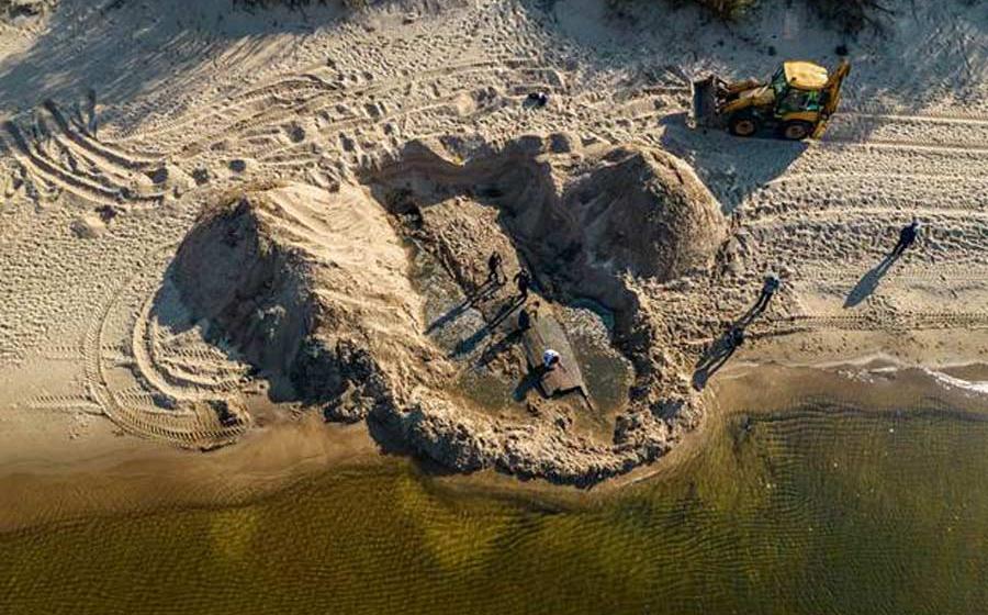 An aerial view of the Latvian shipwreck as it was found in deep beach sand near the country’s capital, Riga.		Source: Rigas Brivosta