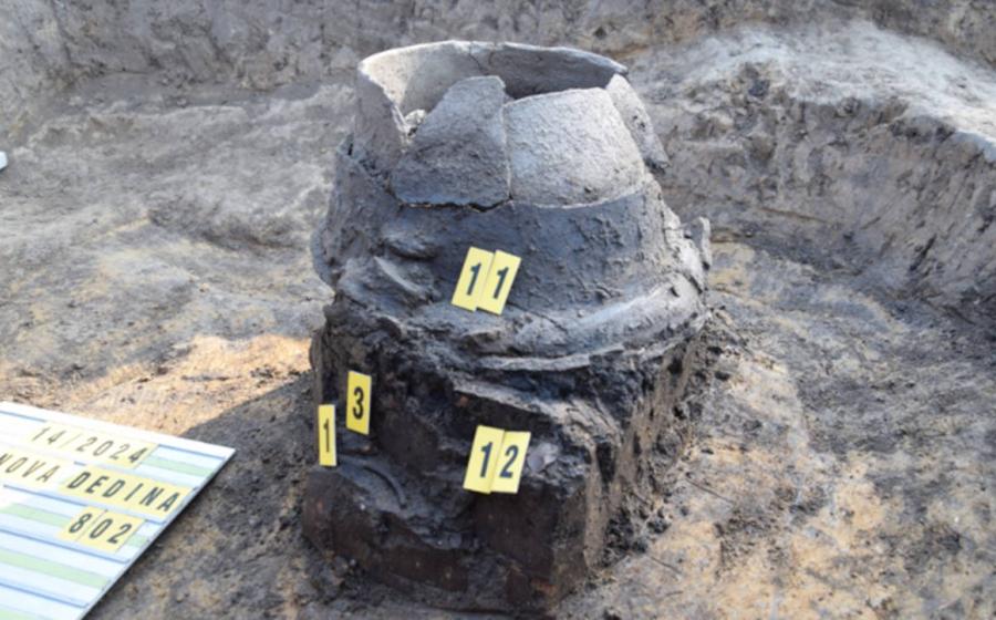 Urn in the grave of the cremated Lusatian discovered in Nové Dědina near Uničov, Czech Republic. 