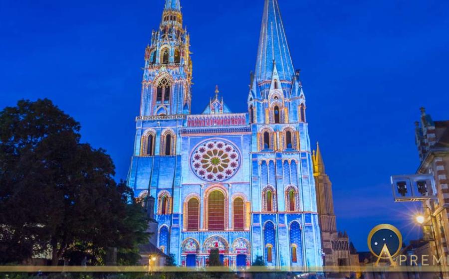 The illuminated Our Lady of Chartres cathedral, France (kovalenkovpetr / Adobe Stock)