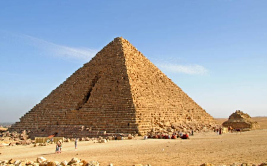 The Menkaure Pyramid at Giza with its distinctive granite casing stones visible at the base
