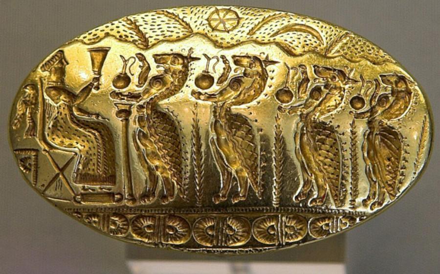 Mycenaean gold signet ring with a seated goddess and procession of Minoan genii, from Tiryns, Greece.