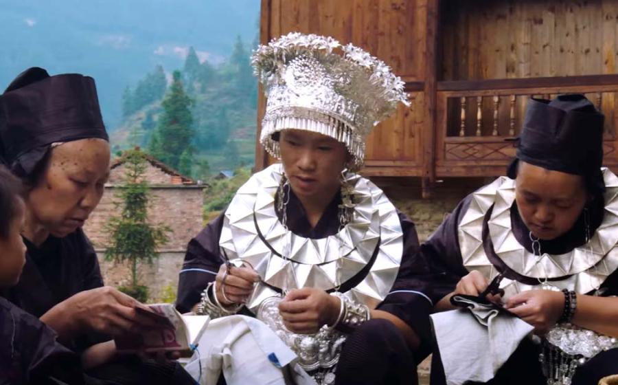 Tin embroidery in Guizhou Province, China. Source: YouTube Screenshot / Great Big Story.