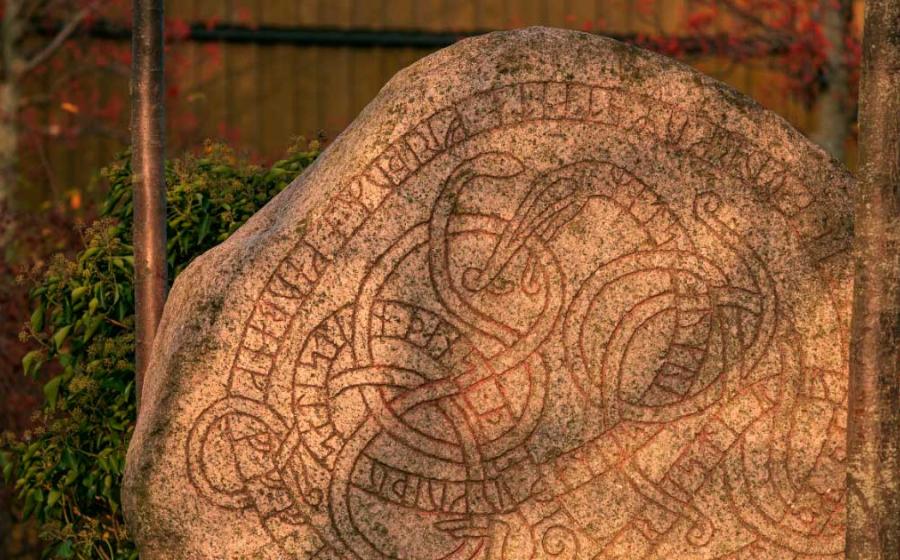 A large Viking rune stone depicting the Midgard serpent in Trelleborg Sweden. Source: Lars Gieger / Adobe Stock