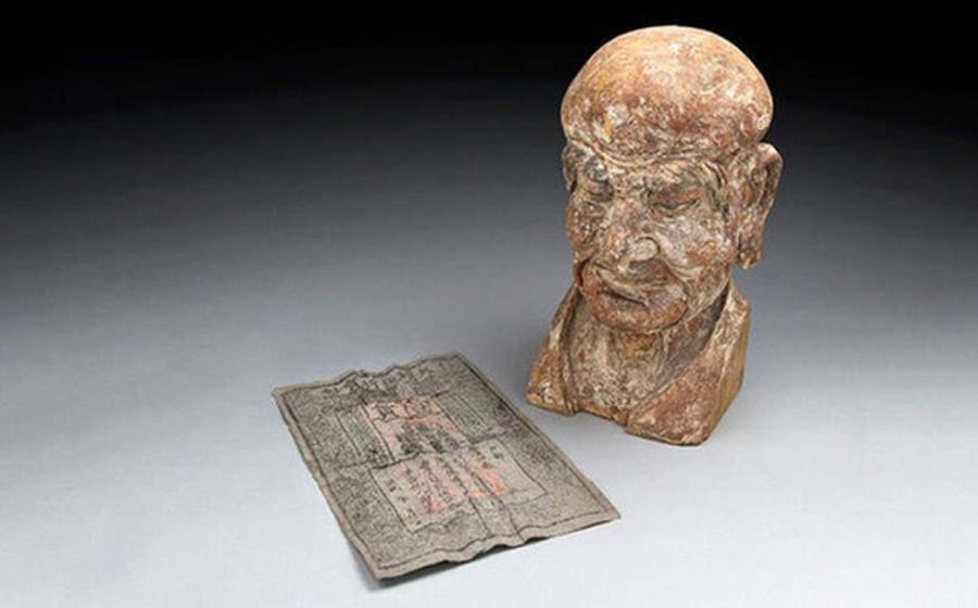 Rare Ming Dynasty Banknote Found Hidden Inside a Chinese Sculpture 