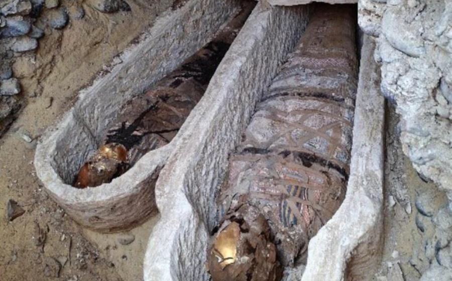 Mummies in sarcophagi at Al-Bahnasa, Egypt.