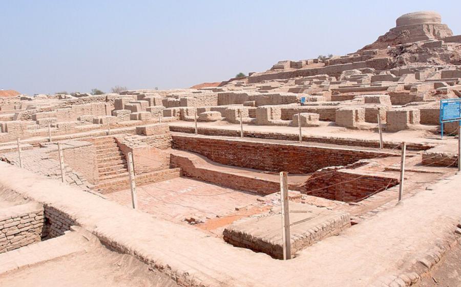 Excavated ruins of Mohenjo-daro, with the Great Bath in the foreground and the granary mound in the background