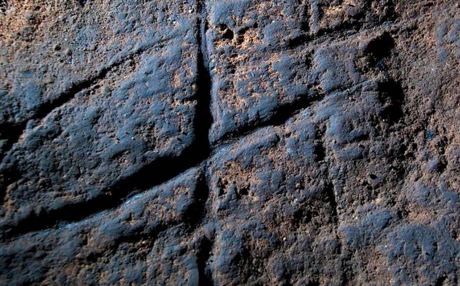 Neanderthal engravings in Gorham’s Cave, Gibraltar. Credit: Stewart Finlayson, courtesy of  Gibraltar Museum. 