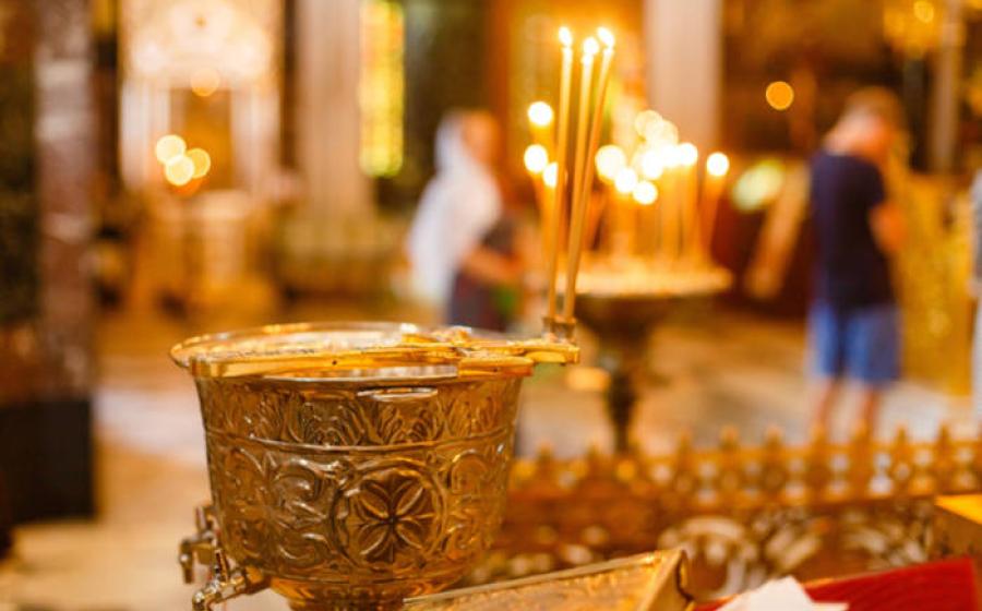 Chalice for olive oil in a religious setting.