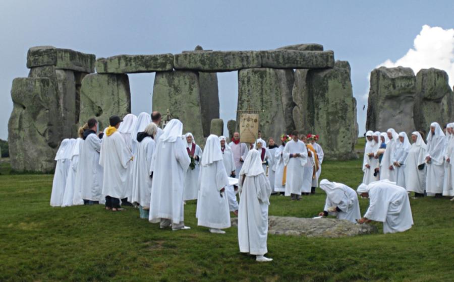 Pagan Druids celebrating at Stonehenge.   