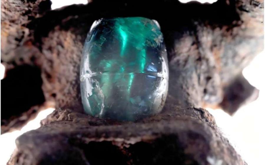 An emerald mounted on a copper pendant recovered from a Coclé burial. 