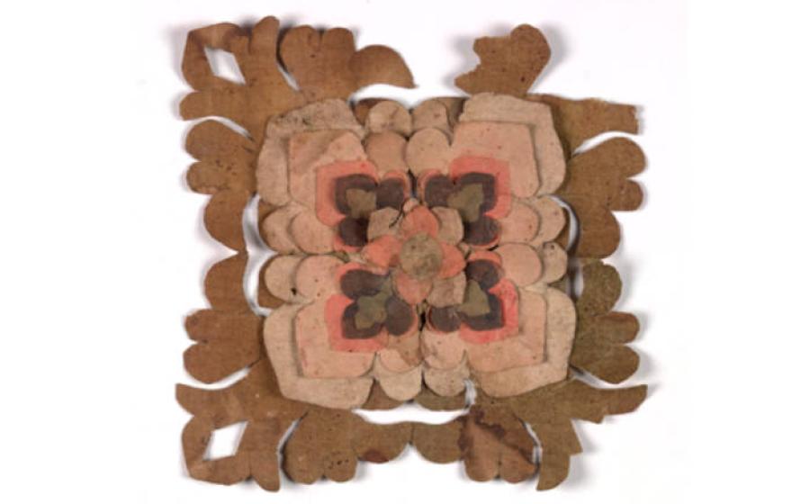 V&A collection image showing the group of nine paper flowers recovered from Cave 17, Mogao Caves. 