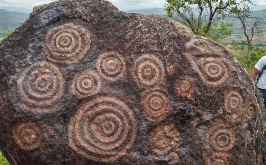 Spirals or concentric circles rock art engraving on a boulder in Venezuela.