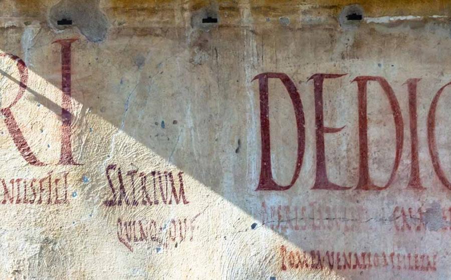 Pompeii graffiti. Source: Niklas / Adobe Stock.