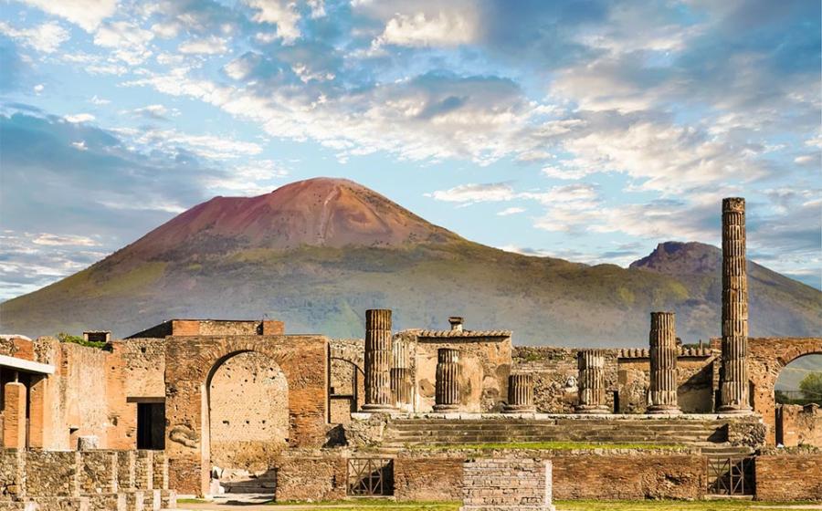 Archaeologists have unearthed “recycling sites” outside the walls of ancient Pompeii, showing the Pompeiians once recycled trash in an a very effective manner. Pictured: shot of the ruins with Mount Vesuvius in the background.      Source: dbvirago / Adobe stock