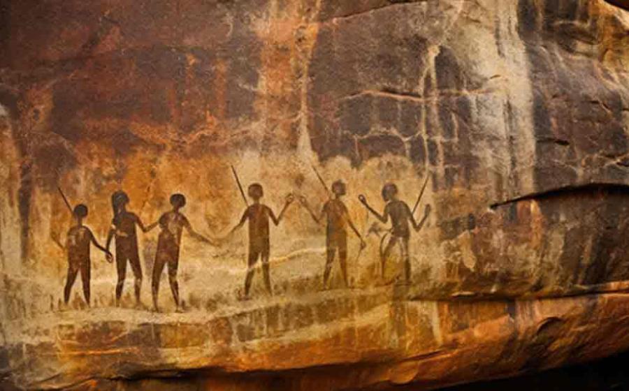 Rock art prehistoric aboriginal cave paintings of human silhouettes. Source: Jan/Adobe Stock