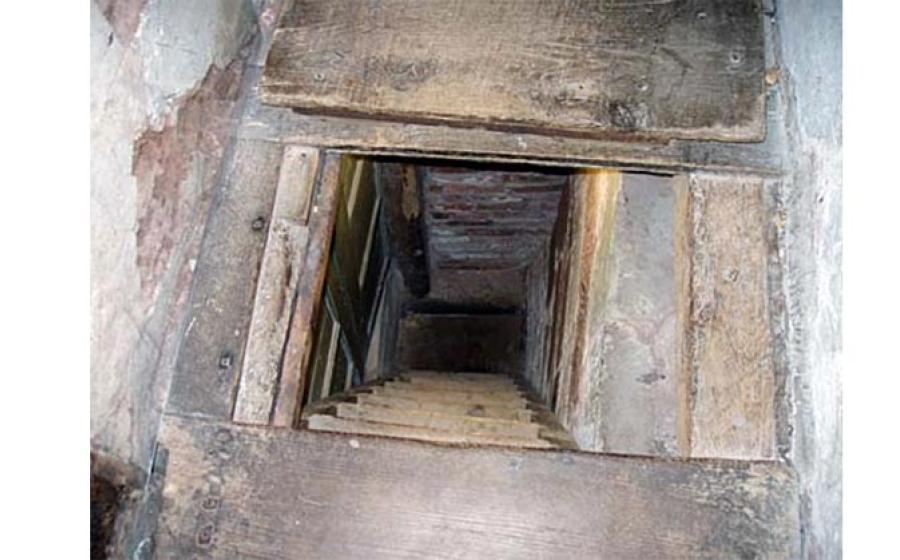 Priest hole in the cupboard of Harvington Hall, Worcestershire