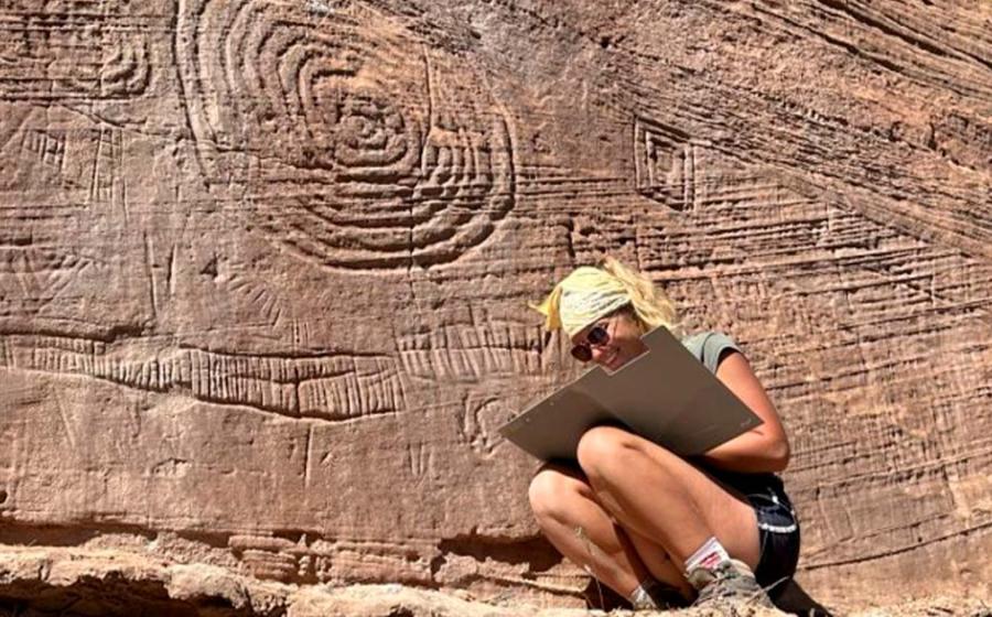 Researcher records pueblo culture petroglyphs found high in Mesa Verde.	Source: Jangiellonian University