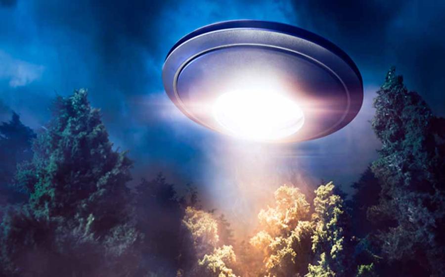 Representational image representing a UFO flying over Rendlesham Forest in Suffolk. Source: fergregory / Adobe Stock