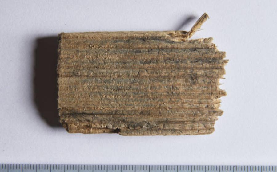 Fragment of a wooden writing tablet that has been examined.